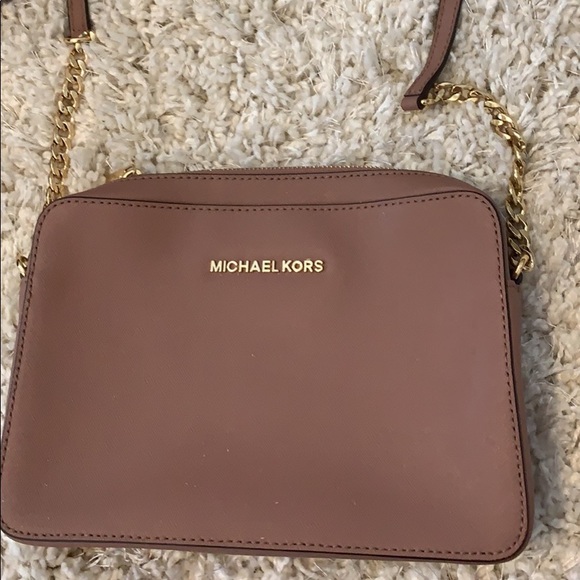 Pink Michael Kors cross body bag